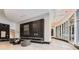 Modern lobby features marble floors, a linear fireplace, and contemporary seating creating an inviting and stylish space at 400 W Peachtree Nw St # 2614, Atlanta, GA 30308