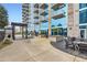 Community patio with outdoor seating and shade structures at 400 W Peachtree Nw St # 2614, Atlanta, GA 30308