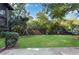 Large backyard featuring grass and a swing set, all surrounded by privacy fencing at 2100 Stone Hollow Ct, Marietta, GA 30062