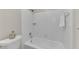 Bathroom featuring tiled shower/tub with white tile surround at 2100 Stone Hollow Ct, Marietta, GA 30062