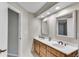 Bathroom featuring double vanity, white countertops and tiled flooring at 2100 Stone Hollow Ct, Marietta, GA 30062