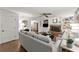 Comfortable living room with hardwood floors, neutral paint, brick fireplace, and built in shelving at 4295 Parish Trce, Marietta, GA 30066