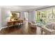 Well lit office featuring hardwood floors, neutral paint, a writing desk, and a comfortable sitting area at 4295 Parish Trce, Marietta, GA 30066