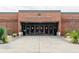 Exterior front entrance of Lassiter High School, with prominent signage and well-maintained landscaping at 4295 Parish Trce, Marietta, GA 30066