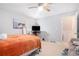 Comfortable bedroom showcasing a ceiling fan and light-colored flooring, ideal for rest and relaxation at 3140 Willow Park Dr, Dacula, GA 30019