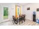 Eat-in kitchen dining area with natural light and outdoor view at 328 Orchid Dr, Mcdonough, GA 30252