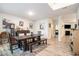 Elegant dining area featuring hardwood floors, a wooden table, and stylish decor at 328 Orchid Dr, Mcdonough, GA 30252