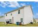 Two story home with white siding and multiple windows, with a ladder propped up against the side at 328 Orchid Dr, Mcdonough, GA 30252