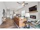 Spacious living area with an open concept floor plan, including kitchen and dining spaces at 613 Stickley Oak Way, Woodstock, GA 30189