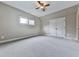 Bright bedroom with large window, light carpet and lots of space at 215 Haleys Ct, Woodstock, GA 30188