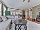 Comfortable living room featuring a gray sectional sofa and a unique round coffee table at 215 Haleys Ct, Woodstock, GA 30188