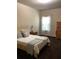 Tranquil bedroom with a comfortable bed, soft lighting, and a dresser near the window at 6074 Locklear Way, Douglasville, GA 30134