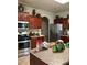 Well-equipped kitchen featuring a gas range, stainless steel appliances, and ample counter space at 6074 Locklear Way, Douglasville, GA 30134
