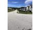 Peaceful street view showcasing a residential neighborhood with sidewalks and mature trees at 6074 Locklear Way, Douglasville, GA 30134