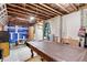 Unfinished basement with exposed beams, concrete walls, and potential for customization at 7730 Tiberon Pkwy, Cumming, GA 30028