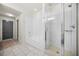 Bathroom featuring a soaking tub, separate shower, and tiled surround at 1100 Howell Mill Nw Rd # 505, Atlanta, GA 30318