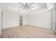 Bright and airy bedroom with light wood floors and a ceiling fan at 1100 Howell Mill Nw Rd # 505, Atlanta, GA 30318