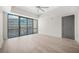 Spacious bedroom with large window that offers a panoramic cityscape at 1100 Howell Mill Nw Rd # 505, Atlanta, GA 30318