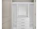 Organized closet with shelving and drawers for optimal storage at 1100 Howell Mill Nw Rd # 505, Atlanta, GA 30318
