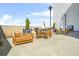 Outdoor patio with lounge chairs, dining table, and BBQ, perfect for entertaining at 1100 Howell Mill Nw Rd # 505, Atlanta, GA 30318