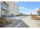 Inviting pool area with lounge chairs around the deck on a sunny day at 1100 Howell Mill Nw Rd # 505, Atlanta, GA 30318