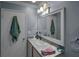 Neutral bathroom features a large vanity, framed mirror, and updated fixtures at 3162 Citrus Ct, Decatur, GA 30034