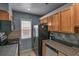 Modern kitchen features stainless steel appliances, granite countertops, and ample cabinetry at 3162 Citrus Ct, Decatur, GA 30034