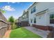 Back of home with fenced yard and grassy area; offers a peaceful outdoor retreat at 355 Niles Ct # 2, Marietta, GA 30060