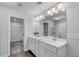 Modern bathroom featuring double sinks, large mirror, white cabinets and enclosed glass shower at 355 Niles Ct # 2, Marietta, GA 30060