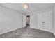 Bright bedroom featuring carpet, modern ceiling light, closet and open entry at 355 Niles Ct # 2, Marietta, GA 30060
