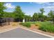 Well maintained dog park with gravel and grass areas, with a black chain link fence at 355 Niles Ct # 2, Marietta, GA 30060