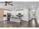 Open concept kitchen with an island and stainless steel appliances, seamlessly connects living spaces at 355 Niles Ct # 2, Marietta, GA 30060