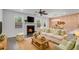 Comfortable living room with a fireplace and exposed brick accent wall, perfect for relaxing at 355 Niles Ct # 2, Marietta, GA 30060