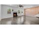 Open-concept living room with a brick accent wall and fireplace, showcasing spacious design at 355 Niles Ct # 2, Marietta, GA 30060