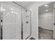 Contemporary white tile shower with glass enclosure and walk-in closet at 355 Niles Ct # 2, Marietta, GA 30060