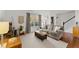 Cozy living room with ample natural light, a comfortable sofa, and stylish decor at 4418 Chowning Way, Dunwoody, GA 30338