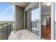 Condo balcony features sliding glass doors leading into the living area, seamlessly blending indoor and outdoor living at 222 12Th Ne St # 1508, Atlanta, GA 30309