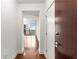 Bright hallway featuring hardwood floors and leading to a living area with a balcony at 222 12Th Ne St # 1508, Atlanta, GA 30309