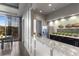 A lounge area features a dining table and an open counter with an open view at 222 12Th Ne St # 1508, Atlanta, GA 30309
