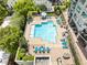 Aerial view of a stunning outdoor pool area with chaise lounges for relaxing at 222 12Th Ne St # 1508, Atlanta, GA 30309