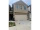 Charming two-story home with a two-car garage at 243 Beau St, Lilburn, GA 30047