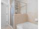 Modern bathroom with a glass-enclosed shower and a soaking tub at 3300 Windy Ridge Se Pkwy # 1212, Atlanta, GA 30339