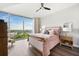 Bedroom with large windows providing expansive views, featuring elegant furniture and a cozy atmosphere at 3300 Windy Ridge Se Pkwy # 1212, Atlanta, GA 30339