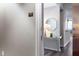 Apartment entry features unit number and a glimpse of stylish foyer with decor at 3300 Windy Ridge Se Pkwy # 1212, Atlanta, GA 30339