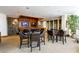 Resident game room with cozy seating, multiple TVs, and built-in serving area at 3300 Windy Ridge Se Pkwy # 1212, Atlanta, GA 30339