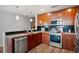 Well-equipped kitchen featuring modern stainless steel appliances and sleek countertops at 3300 Windy Ridge Se Pkwy # 1212, Atlanta, GA 30339