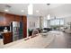 Open concept kitchen with stainless steel appliances and stone countertops at 3300 Windy Ridge Se Pkwy # 1212, Atlanta, GA 30339