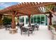 Outdoor patio with a pergola and plenty of seating for residents to enjoy at 3300 Windy Ridge Se Pkwy # 1212, Atlanta, GA 30339