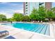 Sparkling outdoor pool with sundeck and lounge chairs; great for relaxing on a sunny day at 3300 Windy Ridge Se Pkwy # 1212, Atlanta, GA 30339