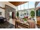Stunning lounge area with stone wall, high ceilings, comfortable seating, and views at 3300 Windy Ridge Se Pkwy # 1212, Atlanta, GA 30339